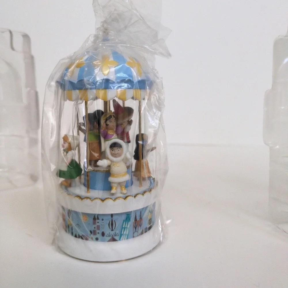 Hallmark Keepsake Ornament Disney Small World Wind Up Musical Carousel 2004